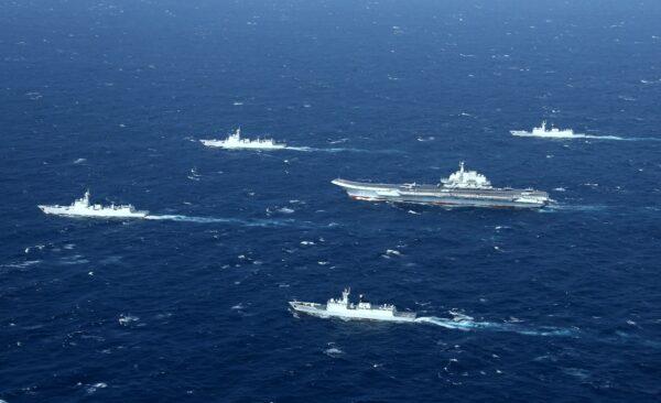A Chinese navy formation, including the aircraft carrier Liaoning (C), during military drills in the South China Sea on Jan. 2, 2017. (STR/AFP via Getty Images)