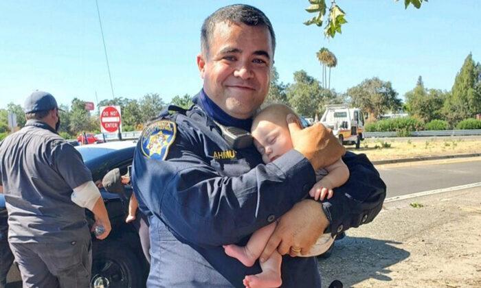 Heartwarming Picture Captures a CHP Officer Holding a 6-Week-Old Baby After a Car Crash