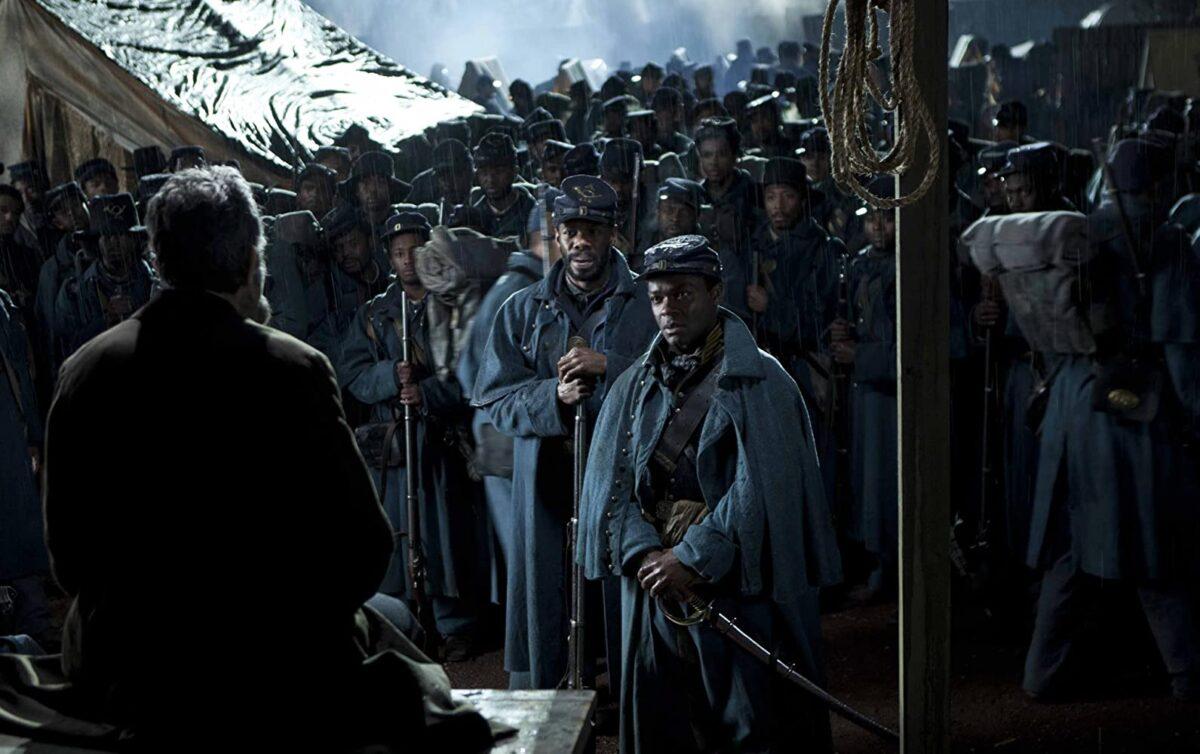 The 16th U.S. president (Daniel Day-Lewis) meets with Civil War soldiers in the biopic "Lincoln." (David James/DreamWorks II Distribution Co., LLC.)
