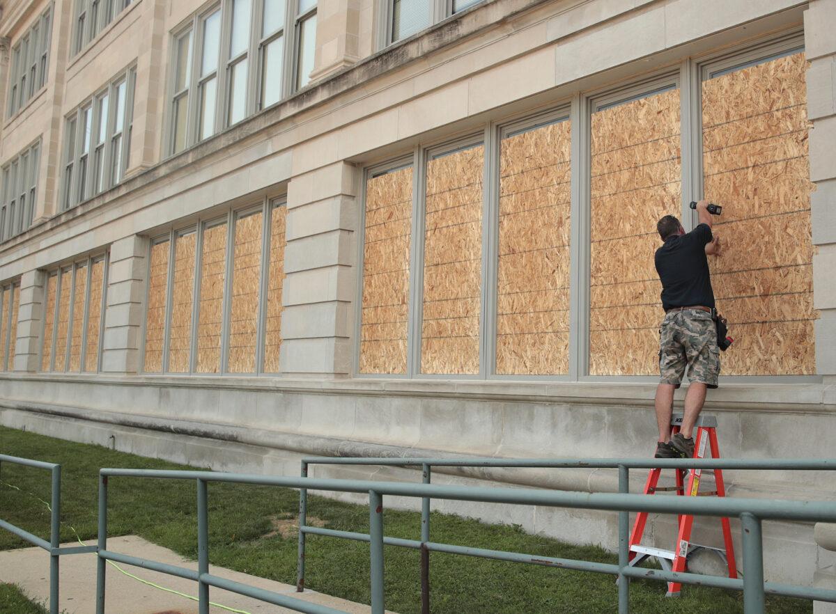 Windows are boarded up at a school near the Kenosha County Courthouse in Kenosha, Wis., on Aug. 24, 2020. (Scott Olson/Getty Images)