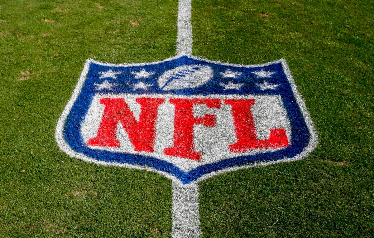 The NFL logo is displayed on the field at the Bank of American Stadium before an NFL football game between the Tampa Bay Buccaneers and the Carolina Panthers in Charlotte, N.C., on Nov. 4, 2018. (Nell Redmond/AP Photo)