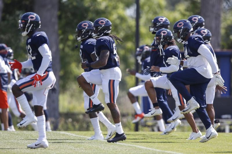 Chicago Bears players warm up during training camp at Halas Hall in Lake Forest, Ill., on Aug. 22, 2020. (Kamil Krzaczynski/USA TODAY Sports)