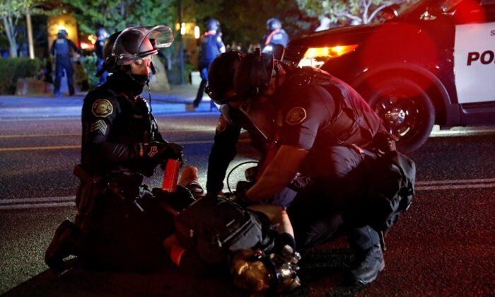 23 Arrested During Riot Outside Portland Police Precinct