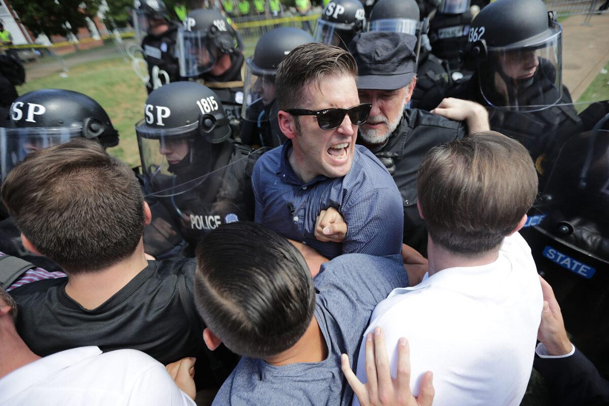 White nationalist Richard Spencer and his supporters clash with Virginia State Police in Emancipation Park after the "Unite the Right" rally was declared an unlawful gathering in Charlottesville, Va., on Aug. 12, 2017. (Chip Somodevilla/Getty Images)