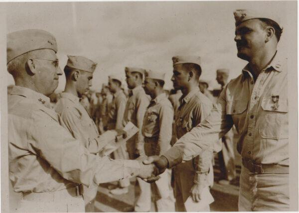 Gen. Holland “Howlin’ Mad” Smith awarding the Bronze Star Medal to Frank Tachovsky Jr. on Saipan. (Joseph Tachovsky Collection)