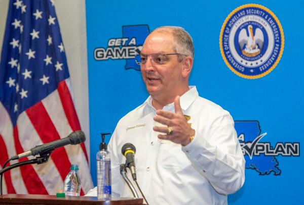 Louisiana Gov. John Bel Edwards answers questions while holding a media briefing about the state's activity related to Hurricanes Marco and Laura in Baton Rouge, La. on August 24, 2020. (Bill Feig./The Advocate via AP)