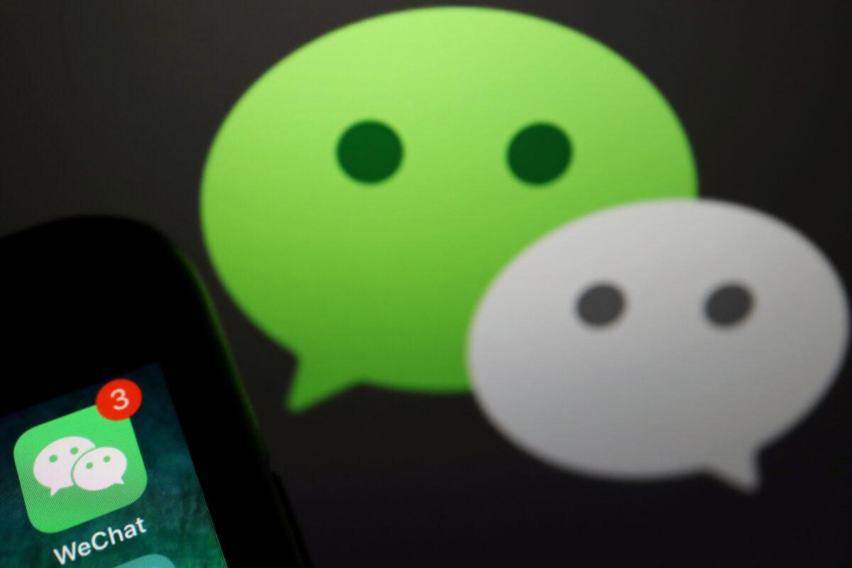 The messenger app WeChat is seen next to its logo in this illustration picture taken on Aug. 7, 2020. (Florence Lo/Reuters)