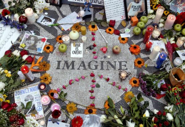 Memorabilia lie in a circle with the word Imagine on it to honor deceased John Lennon in Central Park's Strawberry Fields in New York on Dec. 8, 2005. Former Beatles member Lennon was shot and killed by Mark David Chapman in front of his apartment twenty five years ago. (Keith Bedford/Reuters/File Photo)