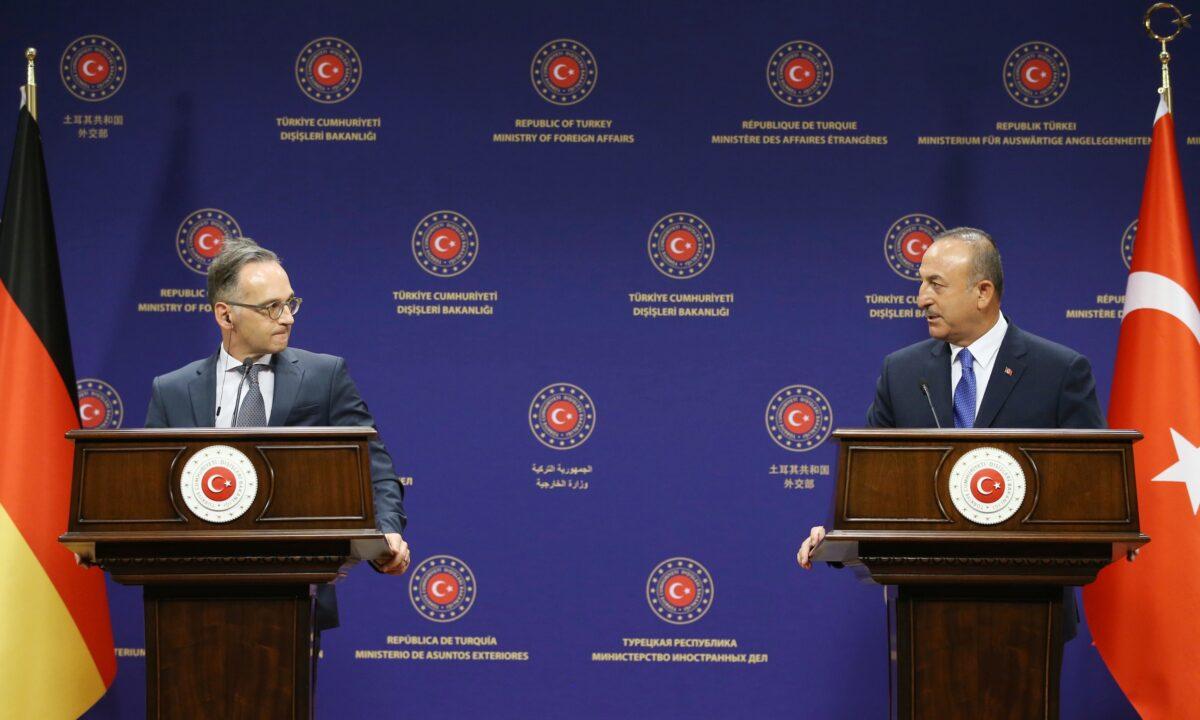 Turkey's Foreign Minister Mevlut Cavusoglu (L) and German counterpart Heiko Maas speak to the media after their talks, in Ankara, on Aug. 25, 2020. (Fatih Aktas/Turkish Foreign Ministry via AP, Pool)