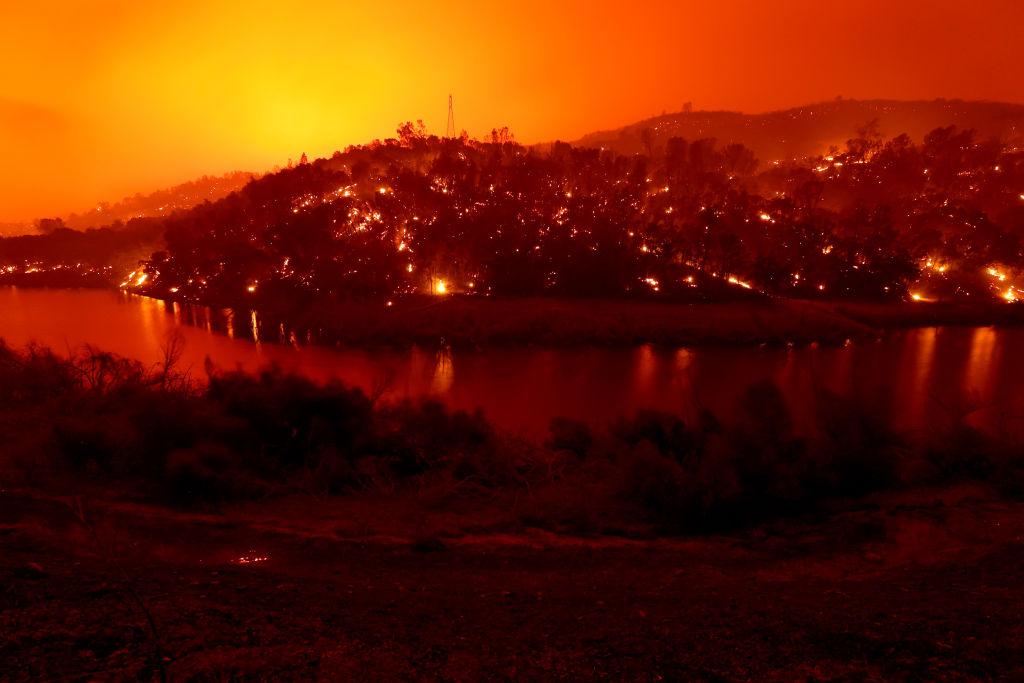 The banks around Lake Berryessa in Napa, Calif., smolder on Aug. 18, 2020 (Justin Sullivan/Getty Images)