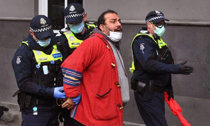 Victoria Police Arrest Four People At Melbourne Protest Against CCP Virus Lockdown