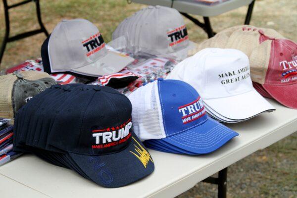 A vendor sells hats at the Freedom Protest Rally in Oak Glen, Calif., on Aug. 15, 2020. (Brad Jones/The Epoch Times)