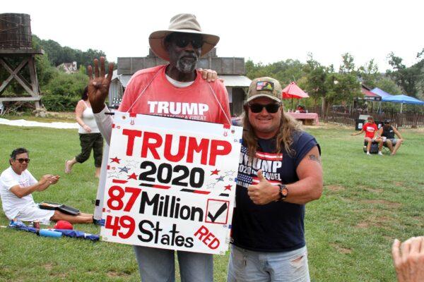 Chauncey "Slim" Killens stands with another attendee of the Freedom Protest Rally in Oak Glen, Calif., on Aug. 15, 2020. (Brad Jones/The Epoch Times)