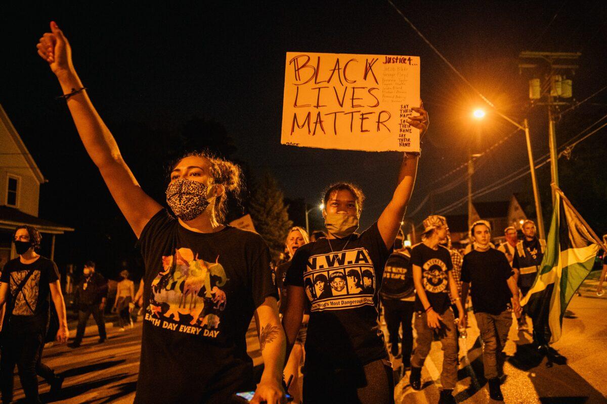 Demonstrators chant in a march in Kenosha, Wis., on Aug. 26, 2020. (Brandon Bell/Getty Images)