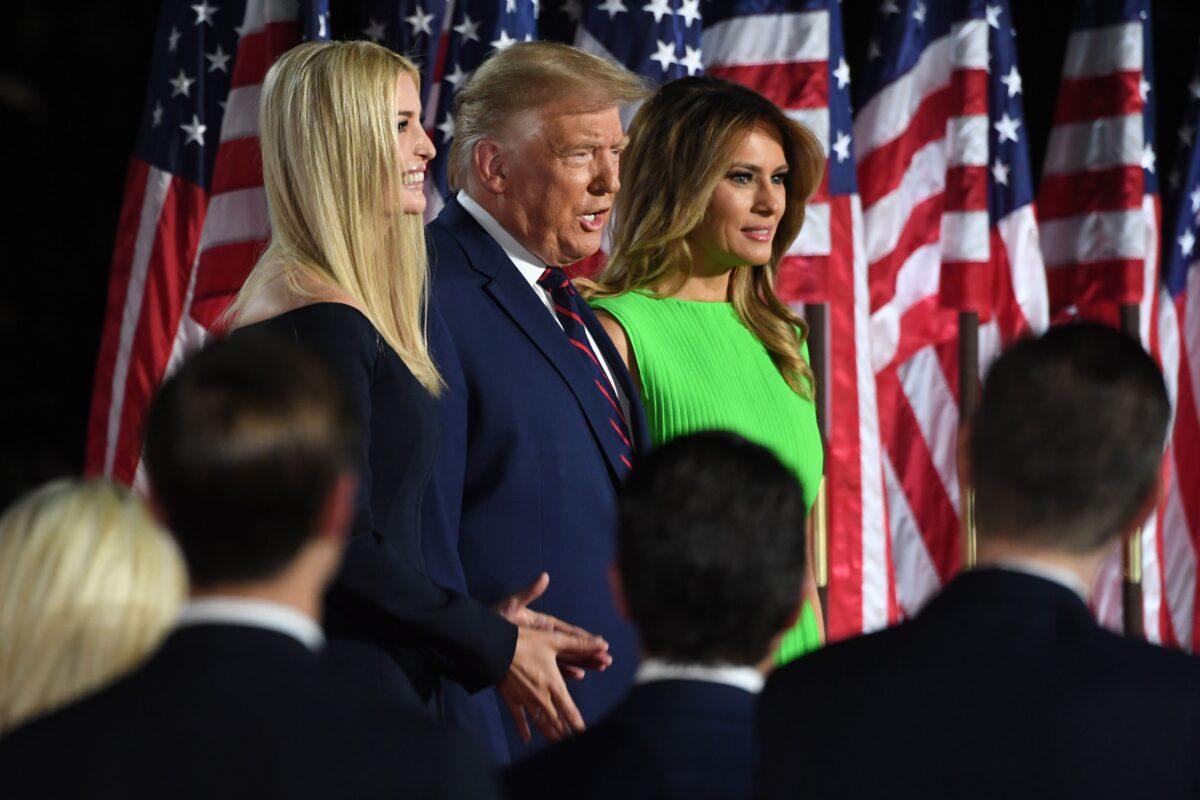 President Donald Trump arrives, flanked by daughter and advisor Ivanka Trump and wife, first lady Melania Trump, to deliver his acceptance speech for the Republican Party nomination for reelection during the final day of the Republican National Convention from the South Lawn of the White House in Washington, on Aug. 27, 2020. (Saul Loeb/AFP via Getty Images)
