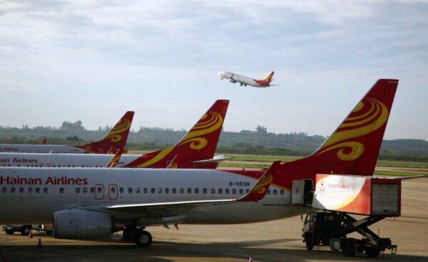 <span style="color: #000000;">China's Hainan Airlines at Haikou Airport in South China's Hainan Province, on June 12, 2014. (AFP via Getty Images)</span>