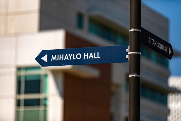 A sign points to the building named after alumnus and former donor Steve Mihaylo on the campus of the California State University–Fullerton in Fullerton, Calif., on Aug. 28, 2020. (John Fredricks/The Epoch Times)