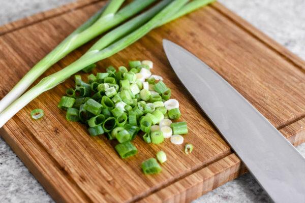 Finely chop the green onions. (Audrey Le Goff)