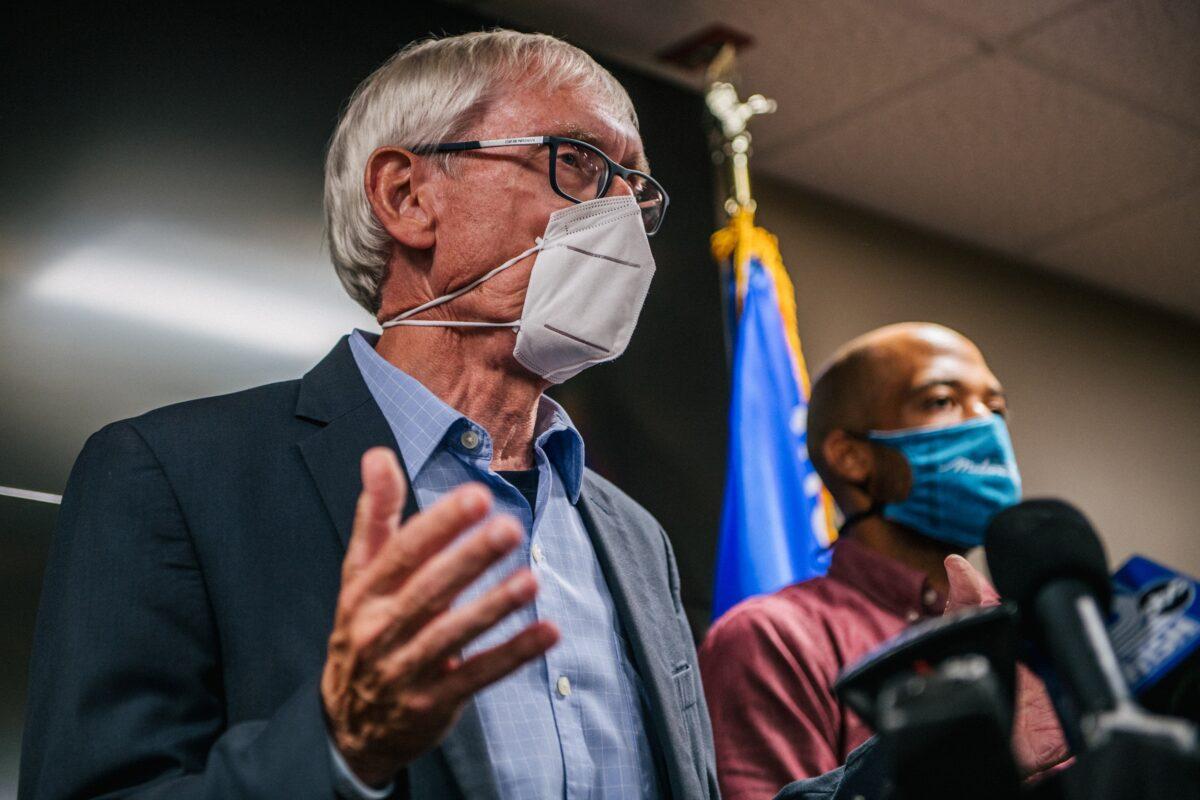 Wisconsin Gov. Tony Evers (L) speaks at a news conference with Lt. Gov. Mandela Barnes in Kenosha, Wis., on Aug. 27, 2020. (Brandon Bell/Getty Images)