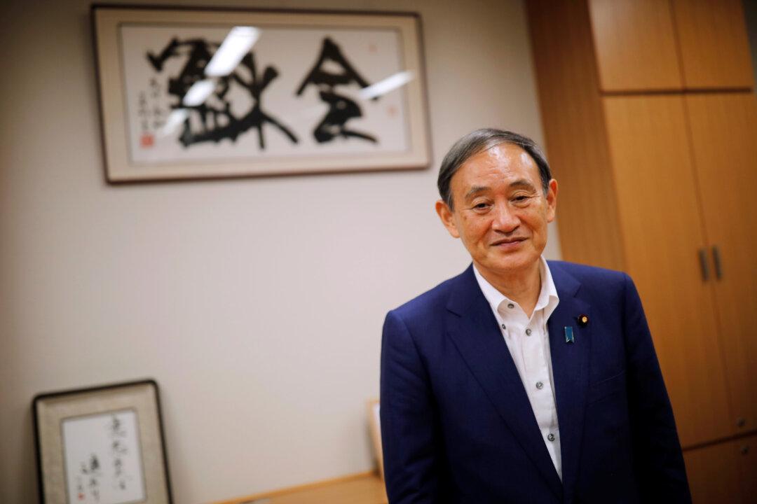 In Race to Replace Japan’s Abe, Loyalist Suga Emerges as Strong Contender