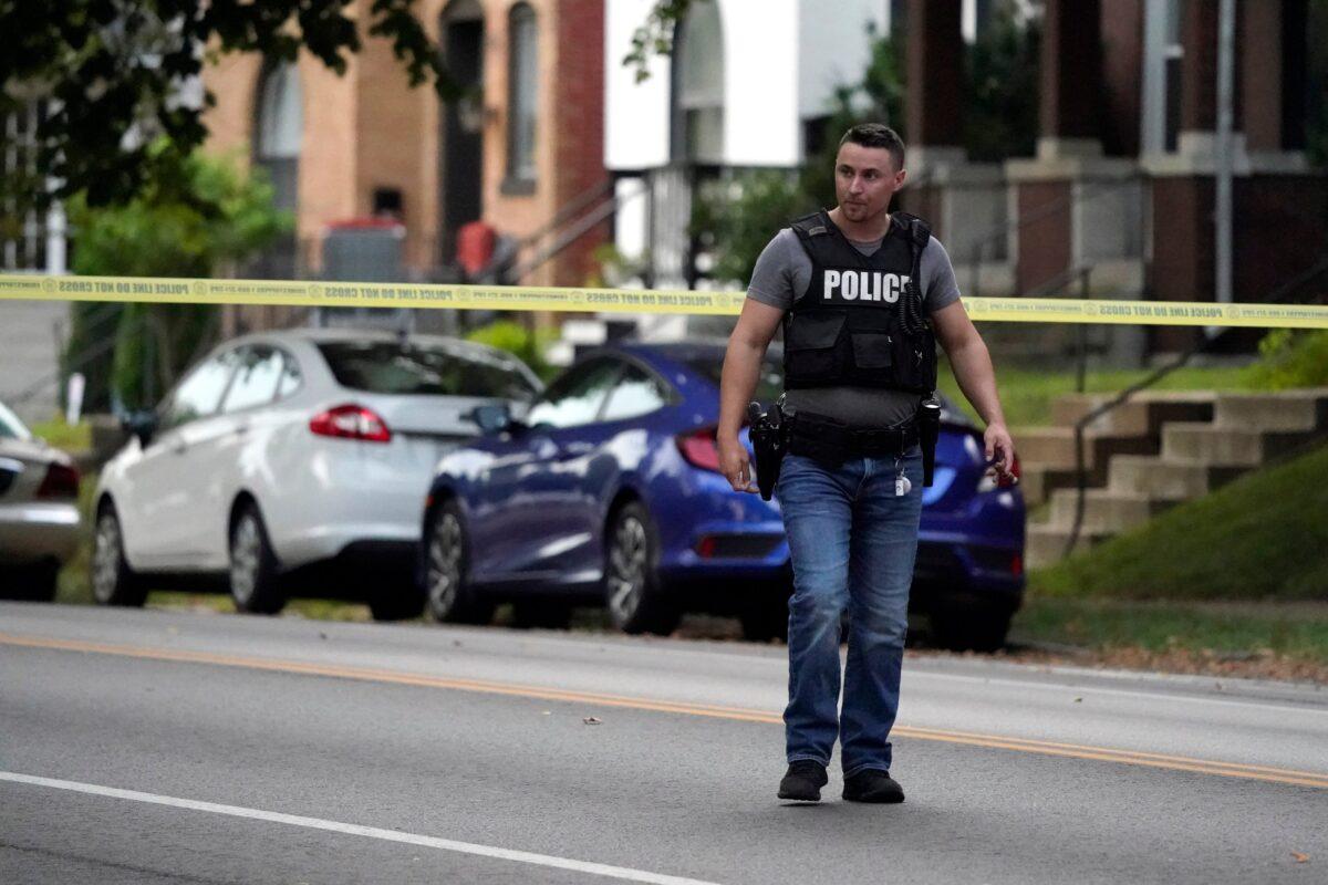 Police work near the scene of a shooting in St. Louis., on Aug. 29, 2020. (Jeff Roberson/AP Photo)