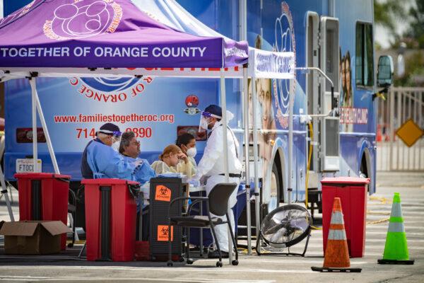 A free, drive-through COVID-19 testing site operated by the nonprofit Latino Health Access at St. Anthony Claret Catholic Church on La Palma Ave. in Anaheim, Calif., on Aug. 25, 2020. (John Fredricks/The Epoch Times)