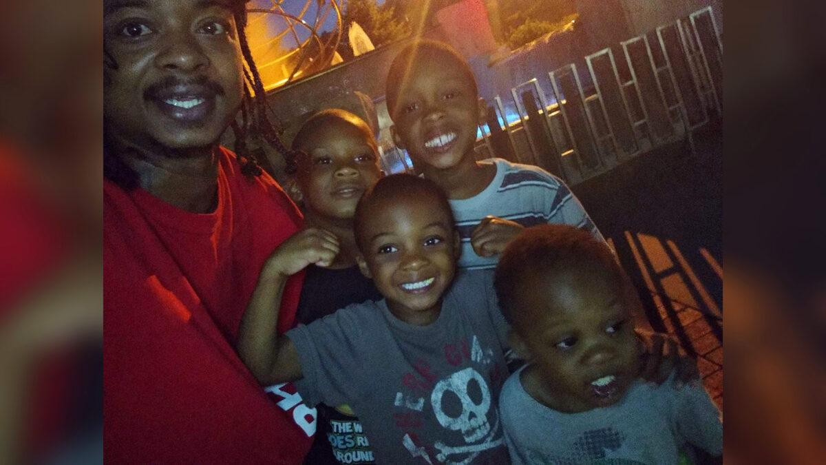 Jacob Blake with his sons in a file photograph. (Ben Crump/Twitter via CNN)
