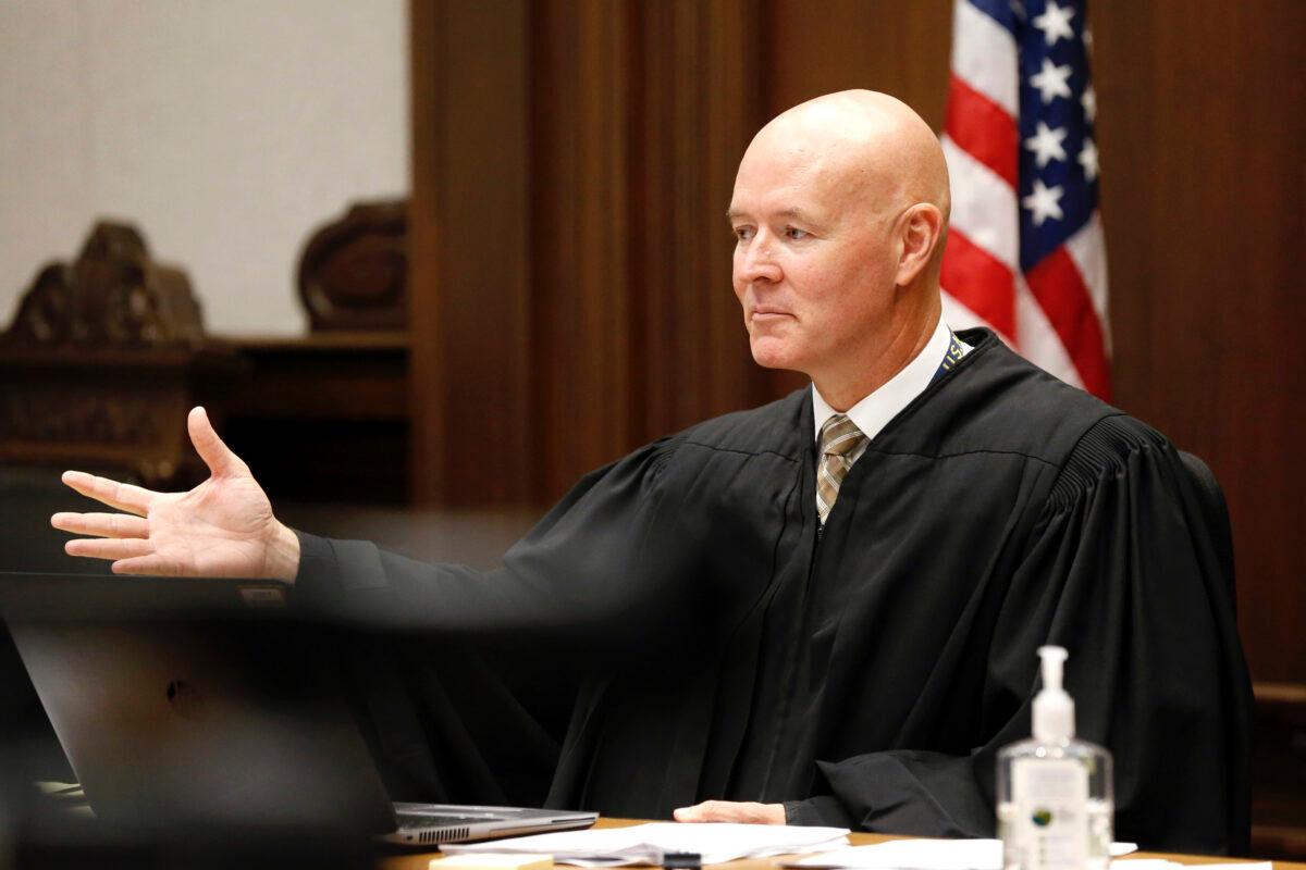 District Court Judge Ian Thornhill presides during a hearing in Linn County District Court in Cedar Rapids, Iowa, on Aug. 27, 2020. (Liz Martin/The Gazette via AP)