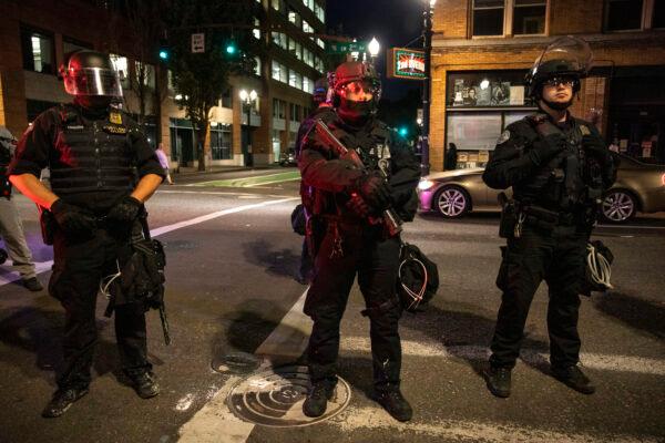 Portland police stand guard in Portland, Ore., on Aug. 29, 2020. (Paula Bronstein/AP Photo)
