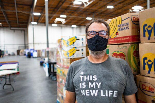 Tim Homan, formerly homeless, was a beneficiary of Saddleback Church’s food pantry, and now leads volunteers at the pantry. (John Fredricks/The Epoch Times)