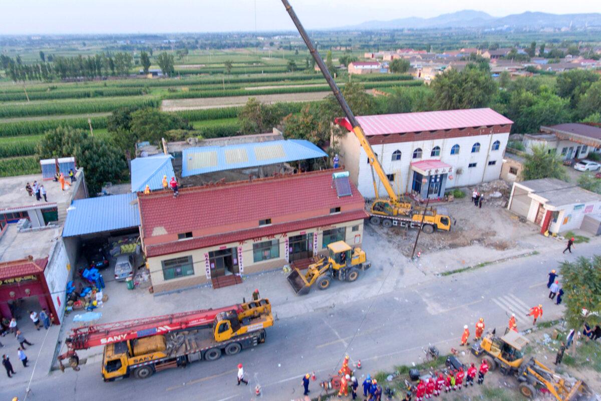 The site of a collapsed two-story restaurant in Xiangfen County of Linfen City, northern China's Shanxi Province on Aug. 29, 2020. (Yang Chenguang/Xinhua via AP)