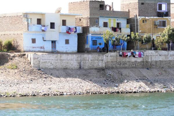 Laundry washed along the Nile River in Egypt is often hung over walls to dry. (Courtesy of Phil Allen)