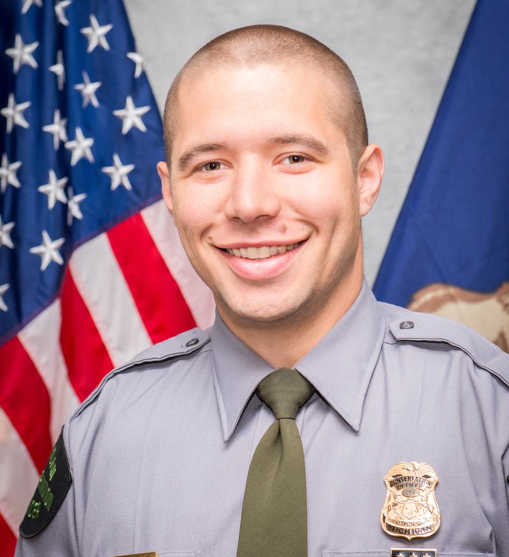 Conservation Officer Robert Slick of the Michigan Department of Natural Resources (Conservation Officer Portraits, 2017) (<a href="https://www.michigan.gov/dnr/0,4570,7-350-79137_79770_79780-538159--,00.html">Michigan Department of Natural Resources</a>)
