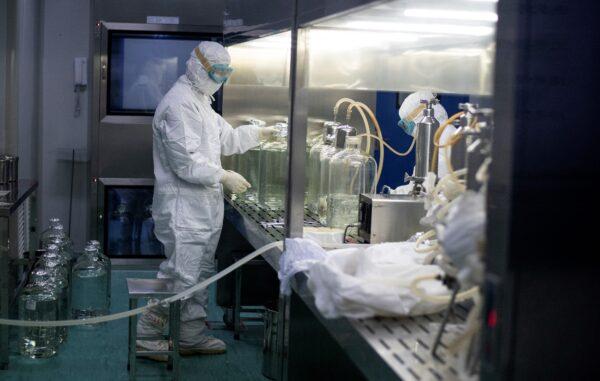  A researcher working in a lab at the Yisheng Biopharma, a company that develops COVID-19 vaccines, in Shenyang, China, on June 10, 2020. (NOEL CELIS/AFP via Getty Images)