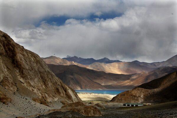 Pangong Tso lake is seen near the India China border in India's Ladakh area, on Sept. 14, 2017. Indian Defense Minister, Rajnath Singh said on Feb. 1, 2021 that India and China will disengage from a ten-month-old military standoff at the Pangong Tso. (Manish Swarup/AP Photo)