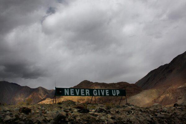 A banner erected by the Indian army stands near Pangong Tso lake near the India China border in India's Ladakh area, on Sept. 14, 2017. (Manish Swarup/AP Photo)