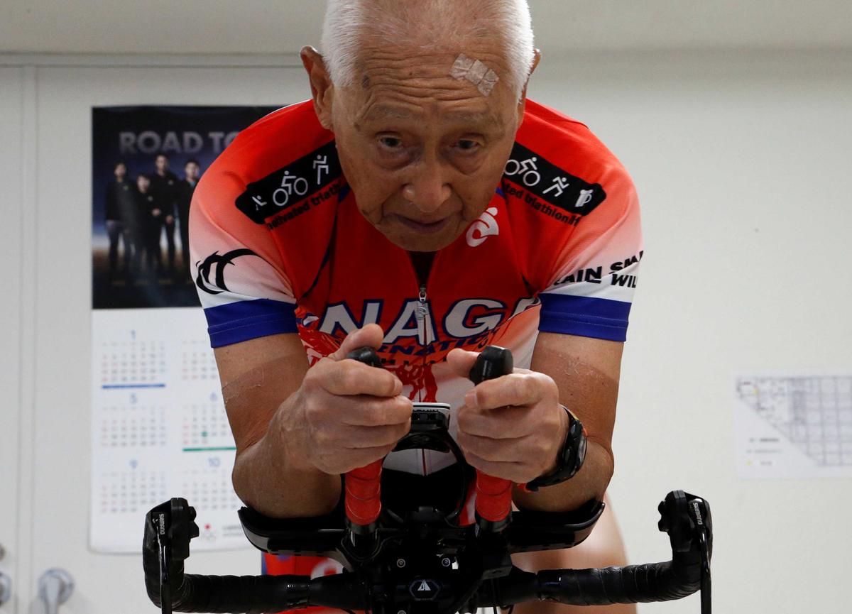 Hiromu Inada, 87, record holder of the oldest person to complete an Ironman World Championship, works out on his bike at his training facility in Chiba, near Tokyo, Japan, Aug. 26, 2020. (Jack Tarrant/REUTERS)