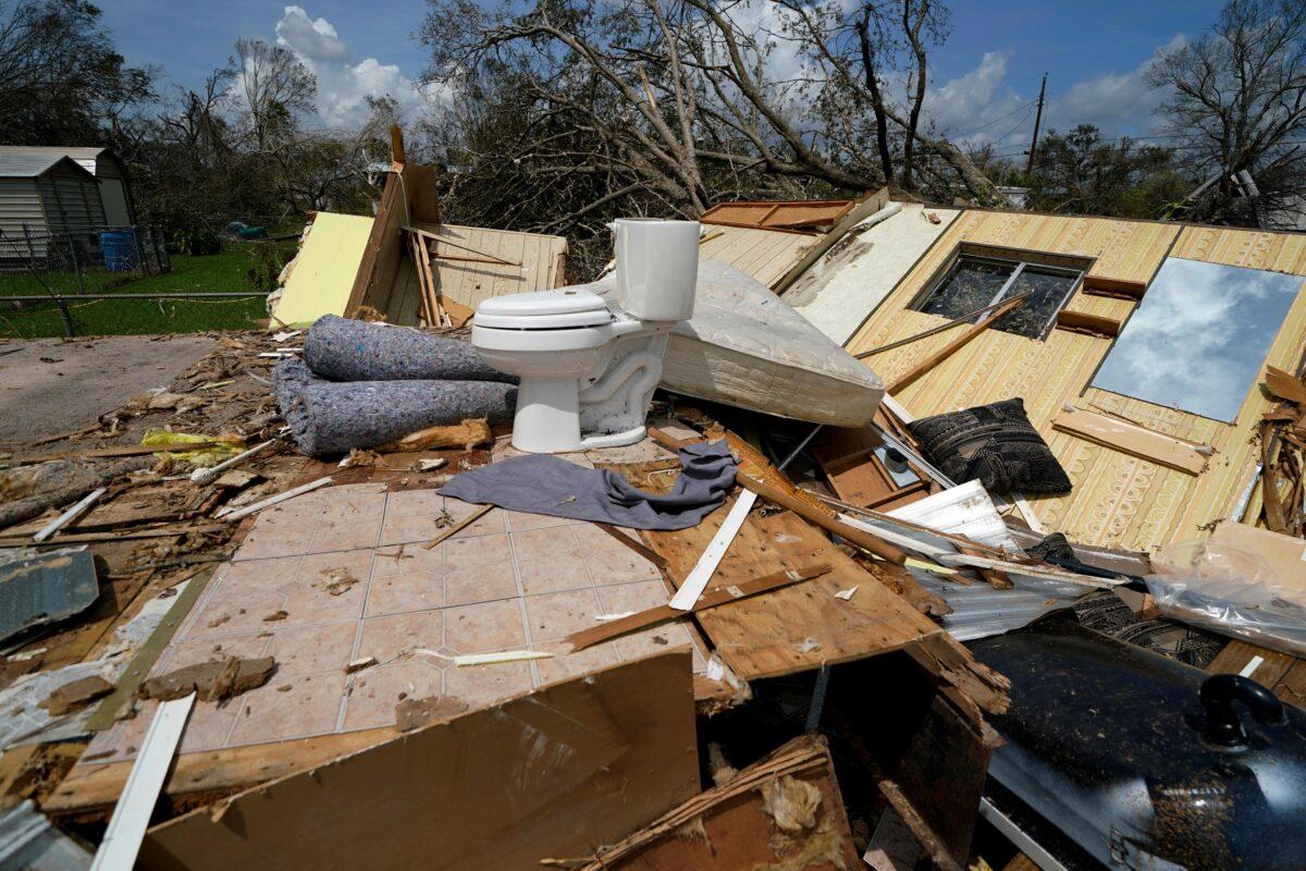 Remnants of the half destroyed mobile home of James Towfley, who is living in the standing half, are seen in Lake Charles, La., on Aug. 30, 2020. (Gerald Herbert/AP Photo)