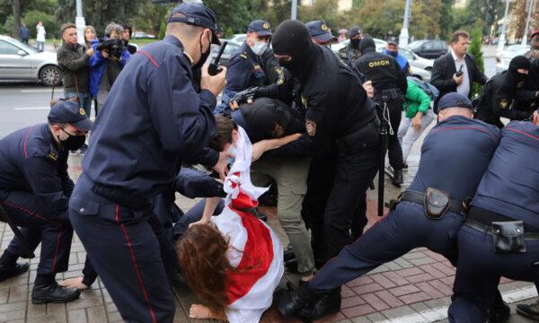 Police detain students during a protest against presidential election results in Minsk, Belarus, on Sept. 1, 2020 (AP Photo).