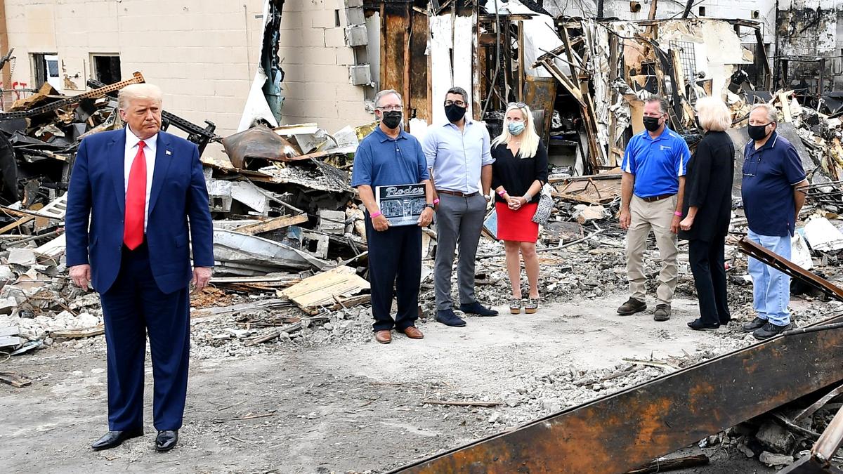 President Donald Trump tours an area affected by civil unrest in Kenosha, Wis., on Sept. 1, 2020. (Mandel Ngan/AFP via Getty Images)