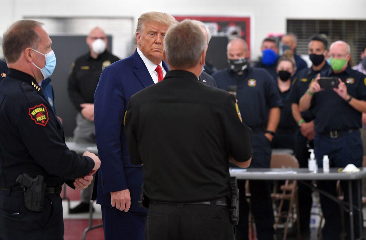 President Donald Trump meets with officials at Mary D. Bradford High School in Kenosha, Wis., on Sept. 1, 2020. (Mandel Ngan/AFP via Getty Images)