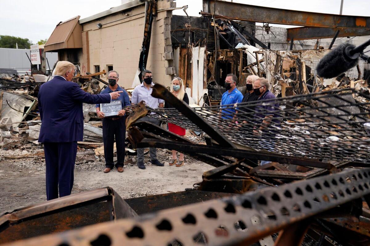 President Donald Trump talks to business owners in Kenosha, Wis., on Sept. 1, 2020. (Evan Vucci/AP Photo)