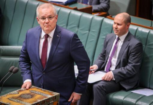 Treasurer Josh Frydenberg sits as he listens to Australian Prime Minister Scott Morrison speak in the House of Representatives during Question Time at Parliament House in Canberra, Australia on Sept. 2, 2020. (David Gray/Getty Images)