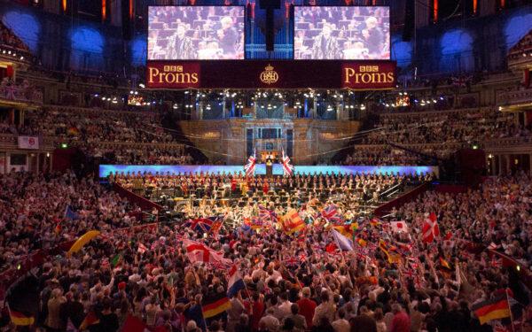 In this file photo revelers wave British flags as they enjoy The Last Night of the Proms celebration in Hyde Park, London, on Sept. 14, 2018. (Reuters/Dylan Martinez)