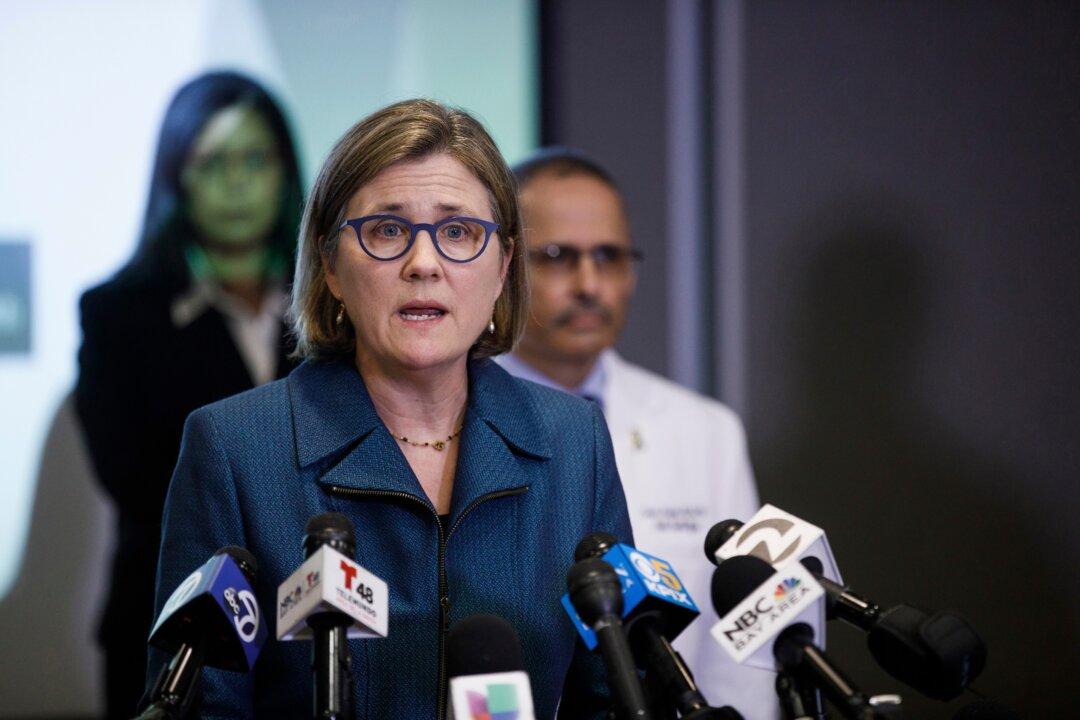 Police: Teacher With Extremist Ties Harassed Health Officer