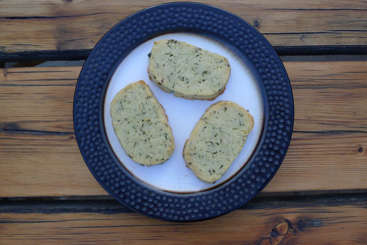 These herb cookies are minimally baked and crumbly, making a lovely coffee sponge, and have a satisfying bite of lemon and a swirl of subtle aromas from the herbs. (Ari LeVaux)