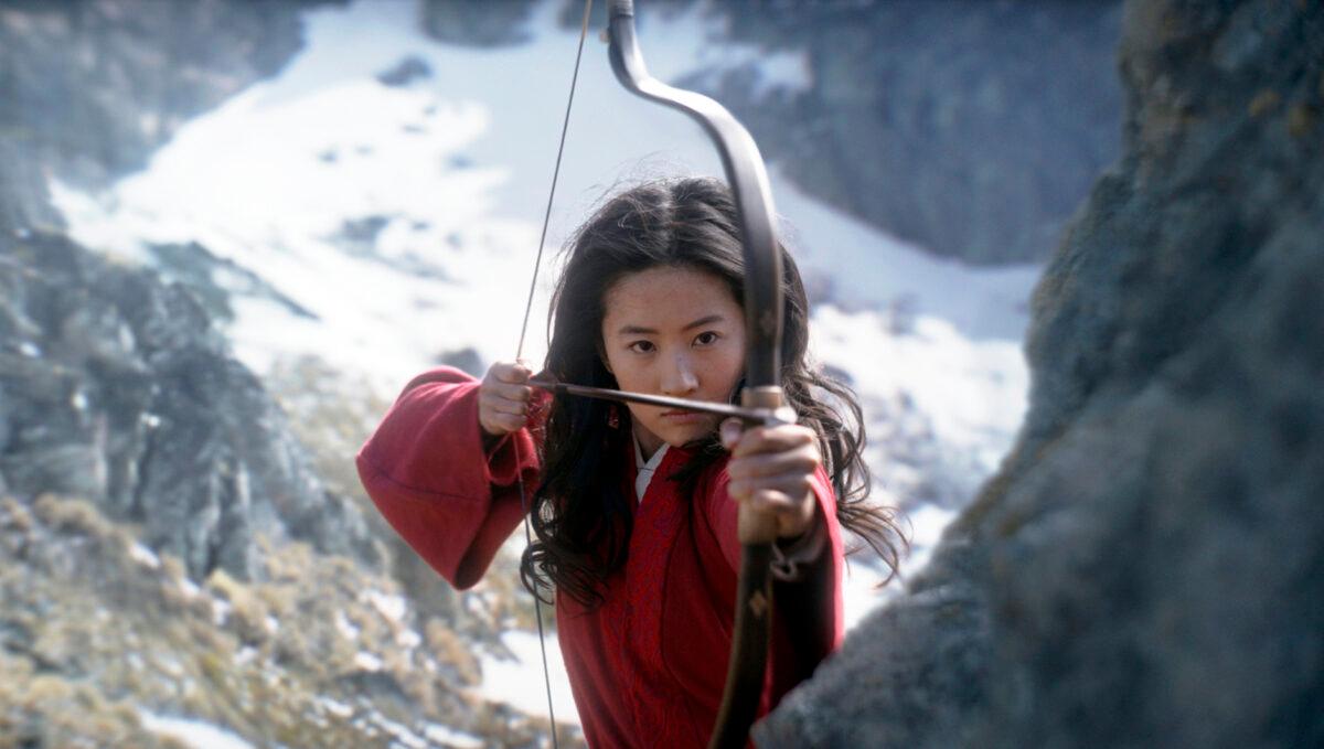 This image released by Disney shows Yifei Liu in the title role of "Mulan." (Jasin Boland/Disney via AP Photo)
