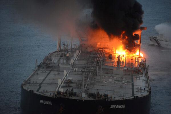 The New Diamond, a very large crude carrier (VLCC) chartered by Indian Oil Corp (IOC), that was carrying the equivalent of about 2 million barrels of oil, is seen after a fire broke out off the east coast of Sri Lanka, on Sept. 4, 2020. (Courtesy Sri Lankan Airforce media/Handout via Reuters)