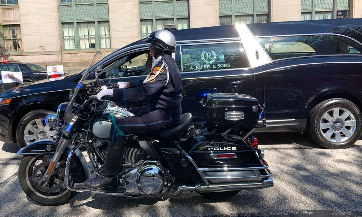 Body of Slain Detective Gets Hero’s Escort to Funeral Home