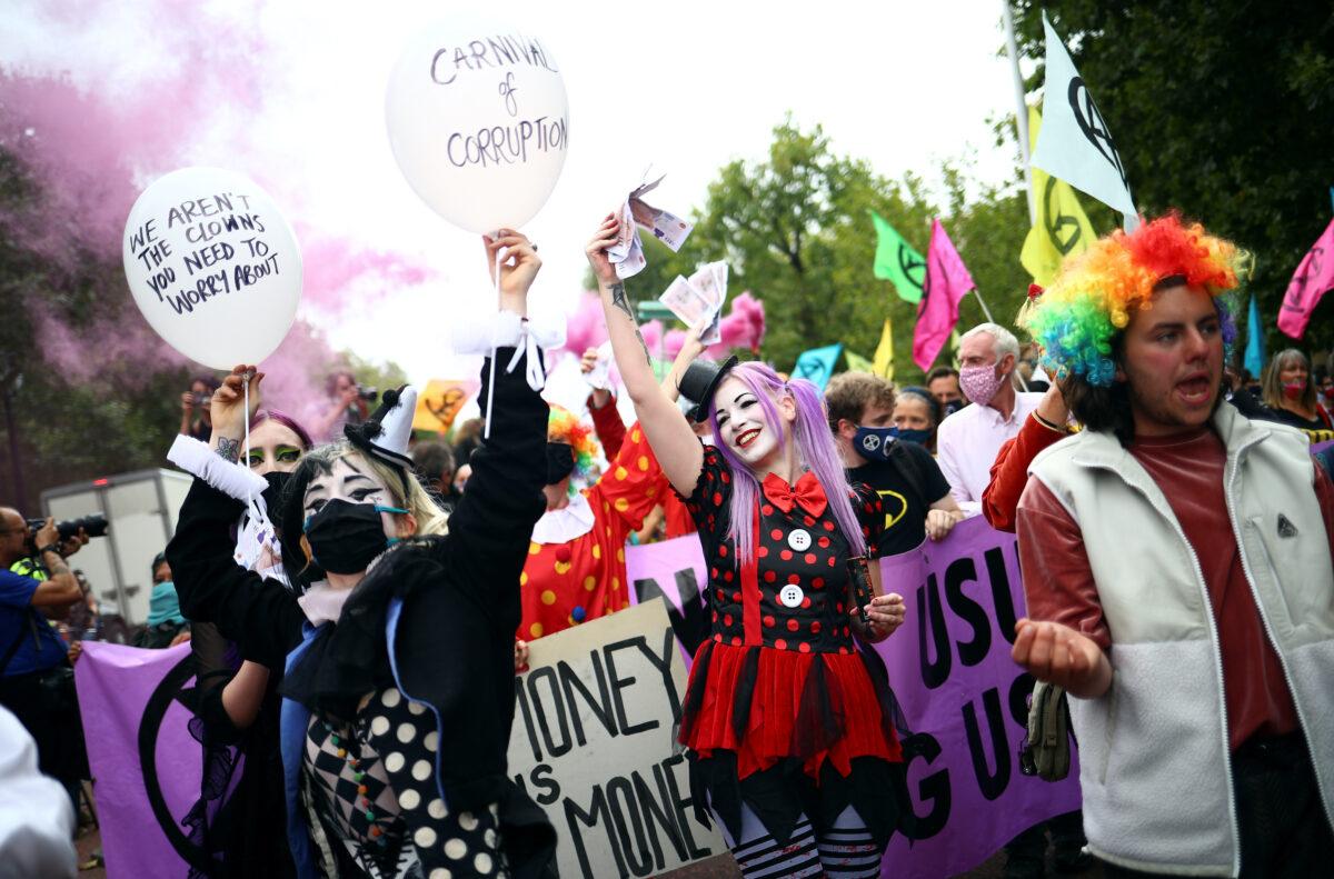 Extinction Rebellion activists participate in a protest in London on Sept. 3, 2020. (Hannah McKay / Reuters)